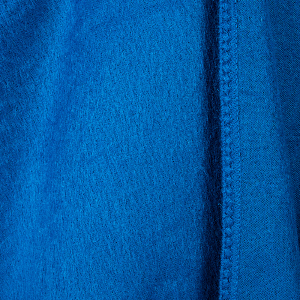 Blue poncho coat