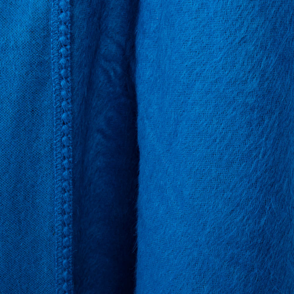 Blue poncho coat